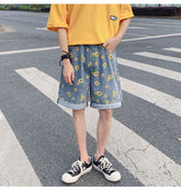 Denim-Shorts mit Sonnenblumen-Muster